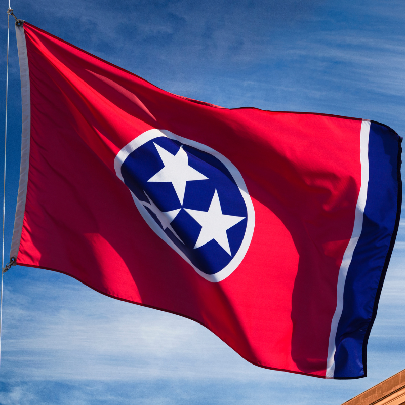The state flag of Tennessee waves in the breeze.